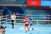 Deutsch: Boxen bei den Olympischen Jugendspielen 2018 Tag 12, 18. Oktober 2018 - Kampf um die Bronzemedaille im Fliegengewicht Mädchen – Heaven Destiny Garcia (USA, blau) schlägt Goryanana Stoeva (Bulgarien, rot) 5-0; Ringrichter ist Ishanguly Meretnyyazov (Turkmenistan). English: Boxing at the 2018 Summer Youth Olympics on 18 October 2018 – Girl's flyweight Bronze Medal Bout - Heaven Destiny Garcia (USA, blue) beats Goryanana Stoeva (Bulgaria, red) 5-0; Referee is Ishanguly Meretnyyazov (Turkmenistan). Español: Boxeo en los Juegos Olímpicos Juveniles de Verano de 2018 en 18 de octubre de 2018 - Combate a medalla de bronce de peso mosca para mujeres: Heaven Destiny Garcia (Estados Unidos, azul) le gana a Goryanana Stoeva (Bulgaria, roja) 5-0; El árbitro es Ishanguly Meretnyyazov (Turkmenistán).