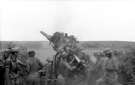 Germans fire an 88mm gun in Tunisia