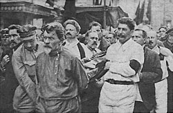 The funeral of Felix Dzerzhinsky took place in Moscow. His comrades-in-arms carried his coffin to the House of the Unions. (from left to right): Rykov, Yagoda, Kalinin, Leon Trotsky, Kamenev, Stalin, Tomsky, Bukharin. Burial of Felix Edmundovich Dzerzhinsky in Moscow (1926).jpg