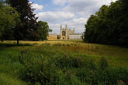 King's College in Cambridge is regarded as one of the greatest examples of late English Gothic architecture. It has the world's largest fan vault, while the chapel's stained-glass windows and wooden chancel screen are considered some of the finest from their era.[38]