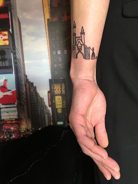 File:Castle and princess forearm tattoo.jpg