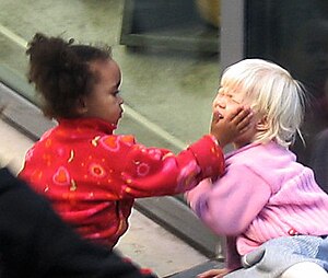 Child touching another childs face.jpg