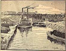 1890 Lithograph of the steamboat landing with the railroad bridge crossing White Oak Bayou in the background City of Houston (1890) (14783364343).jpg