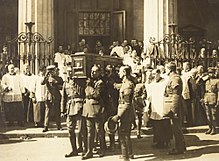 The funeral of Michael Collins
St. Mary's Pro-Cathedral, Dublin, August 1922 Coffin of Michael Collins being carried from the Pro-Cathedral (15766239474).jpg