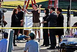 Paget Brewster (third from the right) filming in 2010