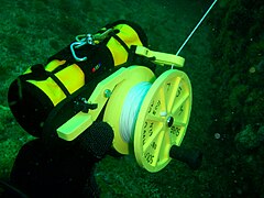 Dive reel with stored DSMB