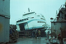 Ferry tipped over in 1980 due to leak in dry dock. Ferry in drydock after tipping over.jpg