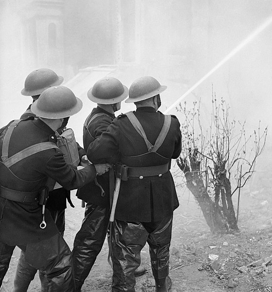 File:Firemen of the National Fire Service tackle a blaze in a house during a Civil Defence exercise in Fulham, London during 1942. D7910.jpg