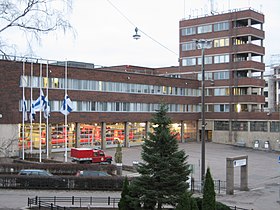Flag of Finland at half-mast in front of fire station.jpg