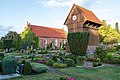 * Nomination Cemetry, wooden belltower and St. Nicholas‘ Church in Edewecht, Lower Saxony --JoachimKohler-HB 00:05, 22 September 2022 (UTC) * Promotion  Comment The subject is mostly in the shadow --PierreSelim 10:20, 22 September 2022 (UTC)  Support Natural sight. Direct sunlight overall is not a criterion for QI. Quality is good. --Milseburg 13:43, 26 September 2022 (UTC)