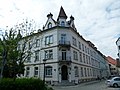 Tenement house, corner house in semi-open development