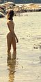 Girl posing nude at the beach.jpg