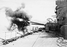 Agamemnon fires her 9.2-inch guns at Ottoman Turkish forts at Sedd el Bahr on 4 March 1915 HMS Agamemnon (1906) 9.2-inch gun firing on Sedd el Bahr 4 March 1915.jpg