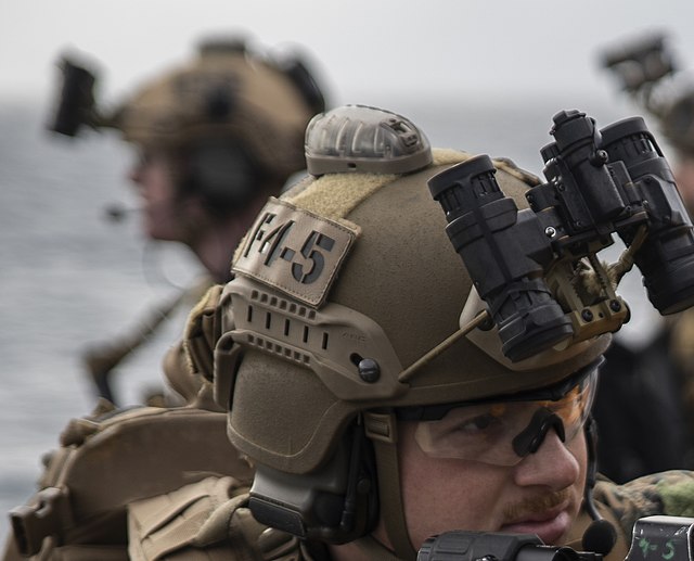 A CORE Survival HEL-STAR 6 IR strobe mounted atop this marine's helmet