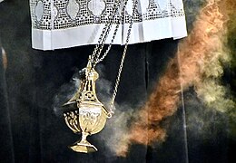 Thurible - a metal censer suspended from chains, in which incense is burned during worship services