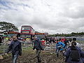 The bus station, at the Isle of Wight Festival 2012, held at Seaclose Park, Newport, Isle of Wight. As can be seen in the photo, the ground had become very muddy after heavy rain in the weeks leading up to the event, as well as on the Thursday of the event.