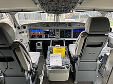 Airbus A220 EICAS at the center JetBlue A220 - cockpit.jpg