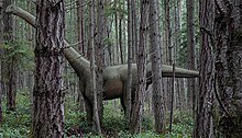 Artist impression of Klamelisaurus in a conifer forest Klamelisaurus-scene-v1.jpg