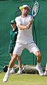 Konstantin Kravchuk competing in the second round of the 2015 Wimbledon Qualifying Tournament at the Bank of England Sports Grounds in Roehampton, England. The winners of three rounds of competition qualify for the main draw of Wimbledon the following week.