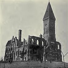 Ruins of the first college building at Toledo, Iowa, after the fire of 1889. LeanderClarkAfter1889Fire.jpg