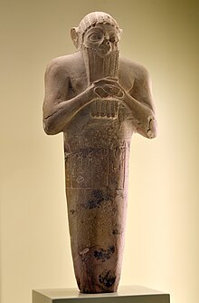 Foundation peg of Lugal-kisal-si, king of Uruk, circa 2380 BCE. The inscription reads "For (goddess) Namma, wife of (the god) An, Lugalkisalsi, King of Uruk, King of Ur, erected this temple of Namma". Pergamon Museum VA 4855. Limestone foundation peg of Lugal-kisal-si, from Uruk, Iraq. C. 2380 BCE. Pergamon Museum.jpg