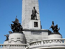 Infantry and Cavalry statues at the corners of the obelisk. LincolnsTombClose.jpg