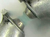 Liquid oxygen, temporarily suspended in a magnet owing to its paramagnetism Liquid oxygen in a magnet 2.jpg