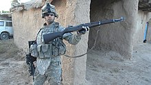 A U.S. infantryman holding an M1 captured in Iraq, 2007 M1 rifle in Iraq.jpg