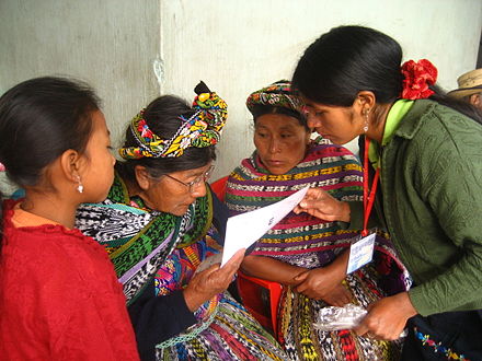 An MCM entrepreneur administers an eye exam to a community member in Concepcion, a village of Quetzaltenango, Guatemala. MCMentrepreneur.JPG