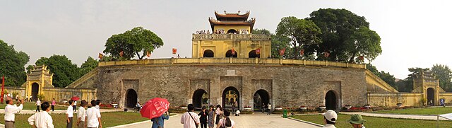 The architecture of the Hanoi citadel gate in the Nguyễn Dynasty, with a stone pedestal from the Thăng Long Imperial Citadel of the Revival Lê period