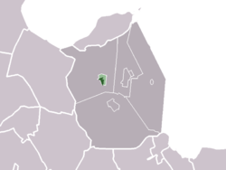 Das Stadtzentrum (dunkelgrün) und der statistische Bezirk (hellgrün) von Slootdorp in der ehemaligen Gemeinde Wieringermeer.