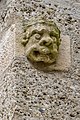 English: Head sculpture of a demon at the northern wall Deutsch: Dämonenkopf aus Stein an der N-Wand