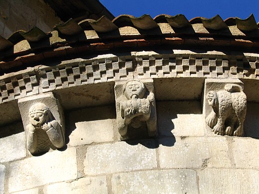 Detail of an apse of Abbey d'Arthous, Landes, France showing corbels representing aspects of sin such as lust, drunkenness and ignorance.