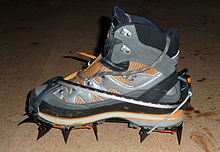A mountaineering boot equipped with a traditional 12-point glacier/trekking crampon Mointain Boot with Crampons.jpg