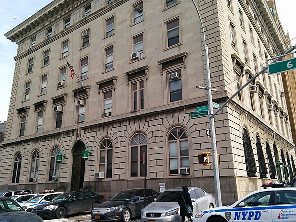 Police cars parked on the sidewalk at the NYPD 78th Precinct building in Brooklyn: An exterior image is used as an establishing shot throughout the sh