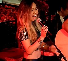 Sanchez performing "Pour It Up" by Rihanna during Crustacean's Red Hour Jam Session in Beverly Hills, California on June 25, 2014. PourItUp.JPG