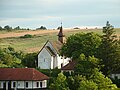 The 900 years old church of village Rakacaszend among the hills of Cserehát