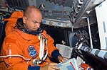 S117E09435 - STS-117 - Sturckow wears LES in the FD on STS-117 Space Shuttle Atlantis - DPLA - 05a7215715a095d66dcf587cabd420c6.jpg