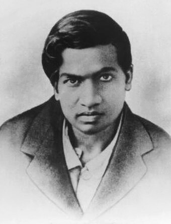 Srinivasa Ramanujan, a mathematician who is widely regarded as a genius. He made substantial contributions to mathematics despite little formal training.[5]