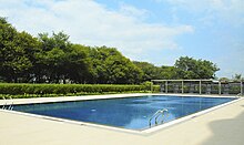 Swimming pool within the DSK Shivajians Dream City complex Swimming pool within the DSK Shivajians Dream City complex, photographed on March 6, 2016.jpg