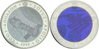 Bimetallic coins minted by the Bank of Kazakhstan with silver ring and tantalum center. These two feature the Apollo-Soyuz and the International Space Station Tantalio.png