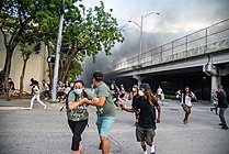 Miami protesters react to police firing chemical irritants on May 30