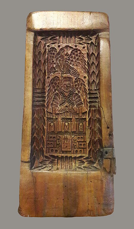 Tập_tin:Toruń_Gingerbread_baking_mould_with_city's_coat_of_arms.jpg