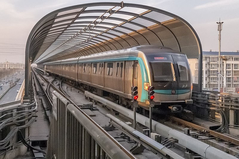 File:Train leaving Xihongmen Station.JPG