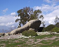 This is the outcropping often referred to as "Turtle Rock". It is held sacred by the Gabrieleno Native Americans, and is located in the northern part of the Turtle Rock neighborhood, near Concordia University, Irvine. Turtle rock feb 2008 detail.jpg