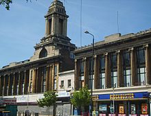 Wickhams Department Store, Mile End Road, Stepney, London, built around the Spiegelhalter jewellers shop Wickham's Department Store Mile End Road.jpg