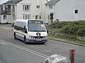 Wightbus 5898 (HW04 DDJ), an Optare Alero, in the Duver, Seaview, Isle of Wight on route 20. It is seen on the last day of the routes operation, and is wearing a wreath on the bonet of the bus to comemorate this.