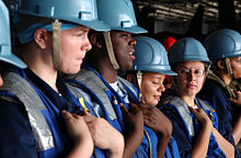 U.S. Navy sailors aboard the USS John C. Stennis wearing blue hard hats in 2001 011217-N-9769S-207 Ready for Working Party.jpg