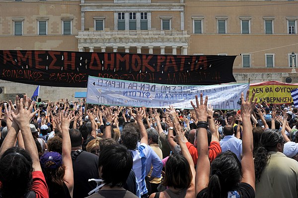 The moutza, an insulting gesture in Greek culture, is extensively used in the protests.