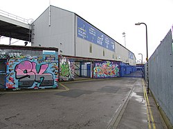 The North Stand and the original Milton Lane. January 2017 2017-01-16 Portsmouth FC, Visiting supporters gate, Milton End, Fratton Park, Portsmouth (2).JPG